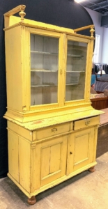 And so is this antique yellow two-piece cabinet hutch.