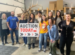Here is the entire Benefit Shop Foundation Team - posing with their auction sign. For my auction, we have a total of 618 lots!