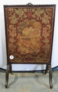 This antique French tapestry fireplace screen is tagged for auction as one lot.