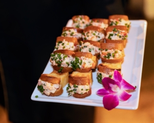 Many small bites were passed around to all the guests. Here is a tray of New England lobster rolls, with house ground 'Old Bay.' (Photo by Bre Johnson/BFA.com)