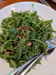 The salad was so fresh. This is arugula with candied hazelnuts, pecorino cheese, and a lemon vinaigrette. We all devoured this salad.