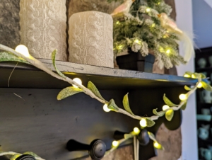 On my mantel are my Glittered Leaf Flower Lights. These lights come in six-foot long strands.
