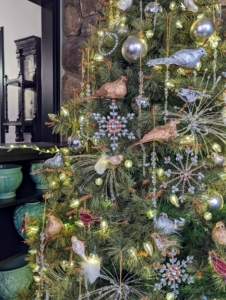 Our tree looks so pretty this year. Look at all the glistening ornaments. As part of my Collection, I am offering 13-piece Tree Decor Kits - complete with stars, wreaths, beaded birds, and metallic bursts. Buy one set, two, or even three and use them on your own tree or give away as gifts.