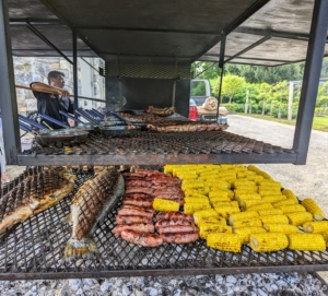 Not far from the table was the giant asado grill filled with so many delicious foods. The charcoal was lighted three hours earlier to get it perfectly hot for cooking.