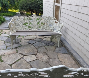And once it's dry, it's ready to be used. Here are two newly painted benches in front of my Flower Room just around the corner from my carport. I think they look great in this space. I am excited to place all the furniture out for the season. Old pieces made to look like new... it's a good thing!