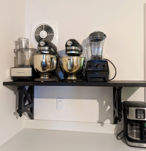 Here's the above counter shelf which also looks great. It holds and stores our often used appliances nearby without using up needed work space below. This job took less than an hour to complete and will serve years of good use. What home projects are you tackling this weekend? Please share them with me in the comments section. I love hearing from all of you.