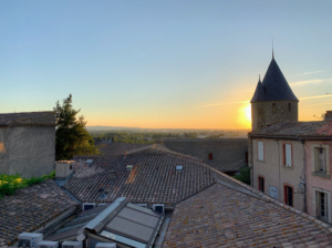 This photo was taken of the sunset from their hotel room inside the city walls.