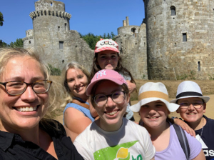 In Bretagne, there is a castle near almost every village. Cedric's family was amused at how fascinating this was for Americans, who don't see castles every day. This photo is of Anduin, her sister-in-law Marianne, Harper, and her cousins Oceane, Maëlys, and Nolann.