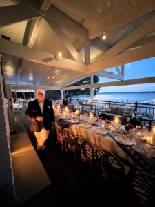 Here is Dennis standing by the beautiful table set for 30 out on the deck with gorgeous views of the Peconic Bay.