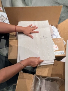Over the last couple of weeks, our team has been working hard to get all the finishing touches done in time for opening day. Here, menus are taken out of the boxes and folded.