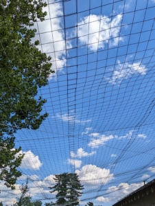 Here is a section showing how it overlaps and connects to the next strip. It is a large pen, so the fence fabric must be installed carefully.