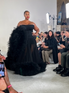 The closing look of the Carolina Herrera Collection was this gorgeous black gown - a strapless black silk chiffon dress trimmed with tulle.