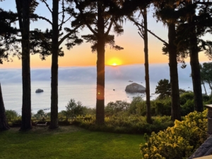 Doug and Amy stayed in a quaint bed and breakfast where they had breathtaking sunset views with the fog rolling over the ocean.