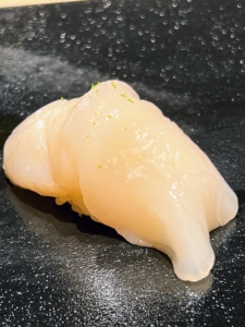 This is a hokkaido sea scallop - known as the most coveted scallops in the sushi culinary world because of their size, meatiness, and amazing flavor.