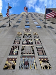 Le Rock is located inside Rockefeller Center's International Building. On the exterior of the building is this grand carved-limestone relief entitled "The Story of Mankind" by Lee Lawrie and colorist Leon V. Solon. This art work screen is divided into 15 small rectangular spaces created to symbolize and chronicle mankind’s progress.
