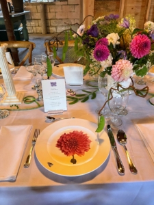 Here is one of the table settings showing dahlia dinner plates by Christopher.