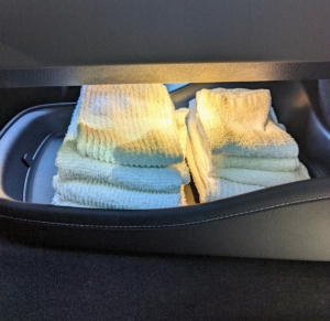I like to keep a supply of bar towels in the car as well - the under-console space is perfect for these 12-inch terrycloth squares. I often place one on my lap while reading the paper, so the ink doesn’t get on my clothes, but they’re also good for wiping up accidental spills or wiping anything that gets wet in the rain.