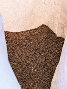The fertilizer is made of insoluble granules that release nutrients as it biodegrades.