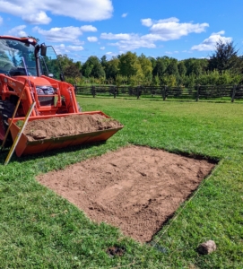 We use our tractor every single day for jobs around the farm. The footprint is now level and ready for the next step...