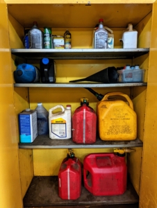 Chemicals and oils are always kept in this storage cabinet specifically designed for flammables.