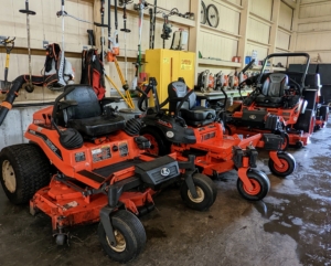 On this side of the Barn, we keep our fleet of Kubota mowers. They are all parked by the back entrance to the barn during the summer season when they are used daily.
