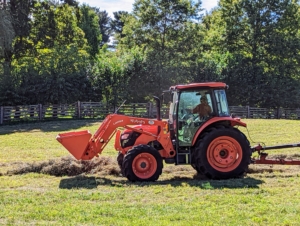 Next, Chhiring pulls the baler with our trusted Kubota M4-071 tractor – a vehicle that is used every day here at the farm.