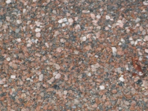 This crushed pink granite is distinct to Mount Desert Island. It is a pink coarse-grained hornblende granite that contains the mineral, biotite.