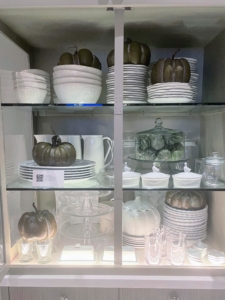 Inside the cabinet - lots of my Martha Stewart Faux Bois Dinnerware. The elegant, rustic wood embossed pattern pieces are a great way to show off all your holiday meals. In addition, the glazed stoneware plates and bowls are also microwave- and dishwasher-safe.