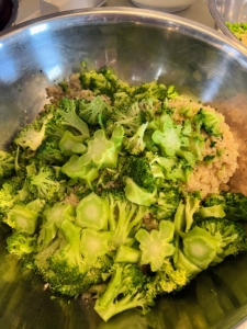 These broccoli heads are cooked until fork tender and placed in the big stainless steel bowl. All my food is completely organic and full of flavor.