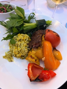 After our tour of the Garden, we sat down to a delectable Persian entrée of grilled jujeh kabob and kabob barg; a bundle of sabzi, or greens; timbale of sabzi polo, which is herbed rice; grilled red, orange & yellow peppers, and plum tomatoes.