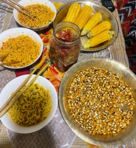 And here is the table filled with Dolma's favorite roasted corn, boiled corn on the cob, and noodle soup.