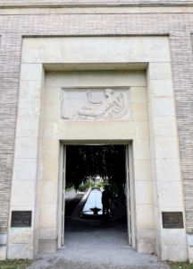 This is the entrance to the Walled Garden of the Untermyer Gardens. It was inspired by the great Indo-Persian gardens of antiquity - originally intended to resemble a "paradise on earth." Above the doorway is a carved stone plaque of a recumbent Artemis sculpted by Ulric Henry Ellerhusen.