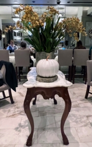 On this table, we have one of my Faux White Pumpkins. This wide 13-inch pumpkin comes in a set of two. The other is tall and measures 10.75-inches in height and 8.25-inches in diameter.
