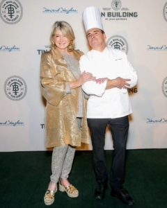 I was so happy to attend the opening of the Tin Building by my friend, Chef Jean-Georges Vongerichten. Here we are posing for press photos taken in front of what is called a "step and repeat" - a banner printed with a repeating pattern showing the event's hosting brand logos. (Photo from BFA)