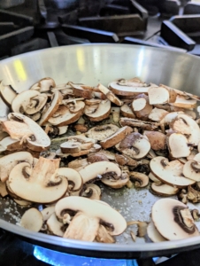 In another skillet, she adds the mushrooms until tender and browned...