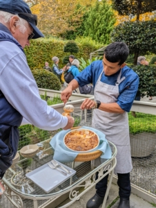 Moises served each guest a piece of warm apple crisp - some even came back for second helpings.