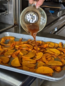 The squash is topped with maple syrup and Chinese five spice and roasted until caramelized and tender.
