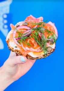 We also tried New York's Apollo Bagels - this one with lox and all the fixings on an everything bagel made with fennel seeds and flaky salt. (Photo by Kate Previte for EEEEEATSCON)