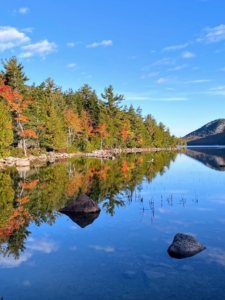 Here is a fall view of Jordan Pond. Jordan Pond covers 187-acres with a maximum depth of 150-feet. The pond was formed by the Wisconsin Ice Sheet during the last glacial period. It serves as the water supply for the village of Seal Harbor.