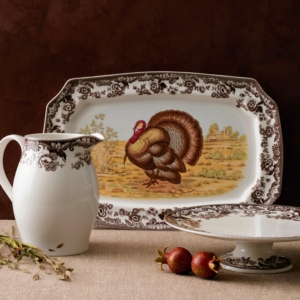 Martha: Harvest + Holiday 2022 offers an easy-to-follow online shopping experience. As you scroll through, click on any of my products to visit its page - it's as easy as that. I love my 17.5-inch Woodland Turkey Rectangular Platter. It's made of fine English porcelain from renowned 18th-century pottery house, Spode. The vintage charm dates to an 1831 design featuring the stately bird in a colorful landscape framed by a contrasting brown floral border. Also here - my Spode Delamere Pitcher and Cake Plate.