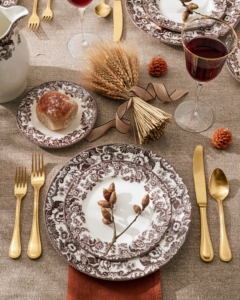 We launched Martha: Harvest + Holiday 2022 just last week. It is our new online option for getting all you've come to expect from us over the last three decades. This is my Delamere Dinnerware Five-Piece Set. It features an iconic British design of intertwining flowers and scrolls in a rich, seasonal brown border. The set includes one complete place setting: dinner plate, salad plate, bread plate, teacup and saucer. Just shop our holiday guide on your desktop or on your mobile device and see this and so much more.