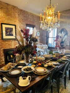 Here's a view from the other side - a beautifully set table with all the traditional holiday dishes.