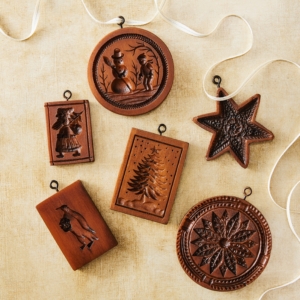 These are special House on the Hill cookie molds. These charming molds come attached with hooks, so they can hang on your tree when not being used for making cookies. Order some for yourself and give some to a baker on your list.