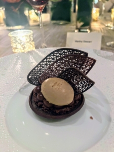 And look at the first dessert - a warm Peruvian chocolate tart with a scoop of toffee ice cream at the base of three chocolate covered cookies.
