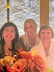 Magazine editor and television personality, Nilou Motamed, Becca PR founder Becca Parrish, and co-owner of Le Bernardin, Maguy Le Coze, stopped for this photo I took from across the table.