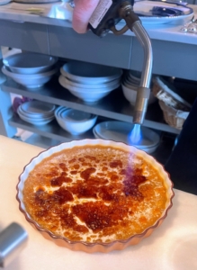 This is a squash crème brulée getting torched. I made two - and both went very quickly.