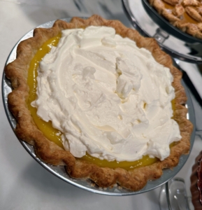 And here is a lemon curd pie topped with whipped cream.