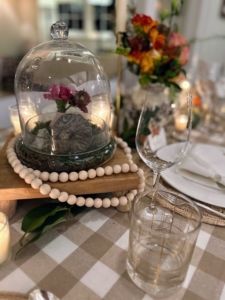 The centerpiece was so thoughtfully created with flowers and natural colored beads.
