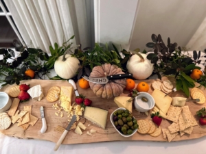 Here is their lovely cheese board decorated with pumpkins and other fruits.