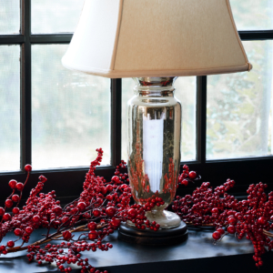 Or, add a touch of red on a table. Full of texture and vivid color, this Faux Red Berry Garland measures six-feet long, offering a variety of styling options for display.